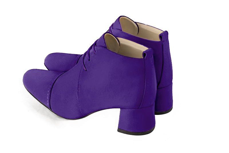 Violet purple women's ankle boots with laces at the front. Round toe. Low flare heels. Rear view - Florence KOOIJMAN